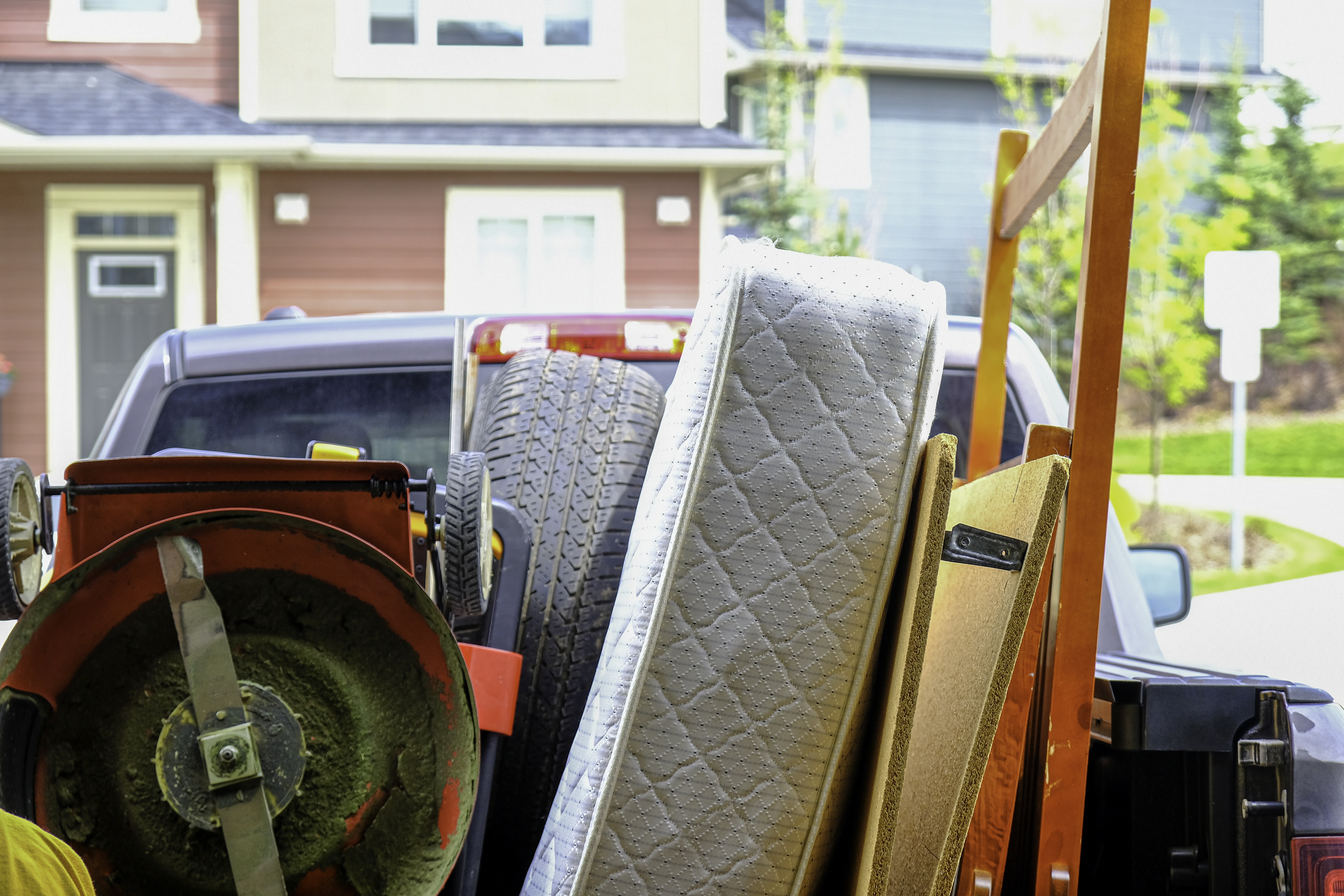 Trash items loaded on a truck to be disposed of at a landfill